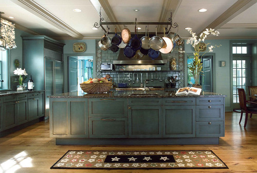 Baltic Brown Granite Countertop and Baltic Brown Island Top,Prussian Blue Antique Stained Hickory Cabinets, Glazed Ceramic Subway Tiles and No Stain Light Oak Flooring